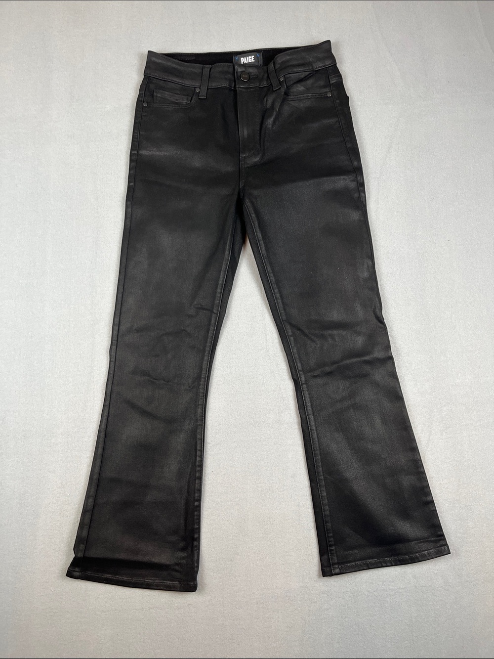 PAIGE Colette Crop Flare Coated Denim Jeans in black
Size: 27
